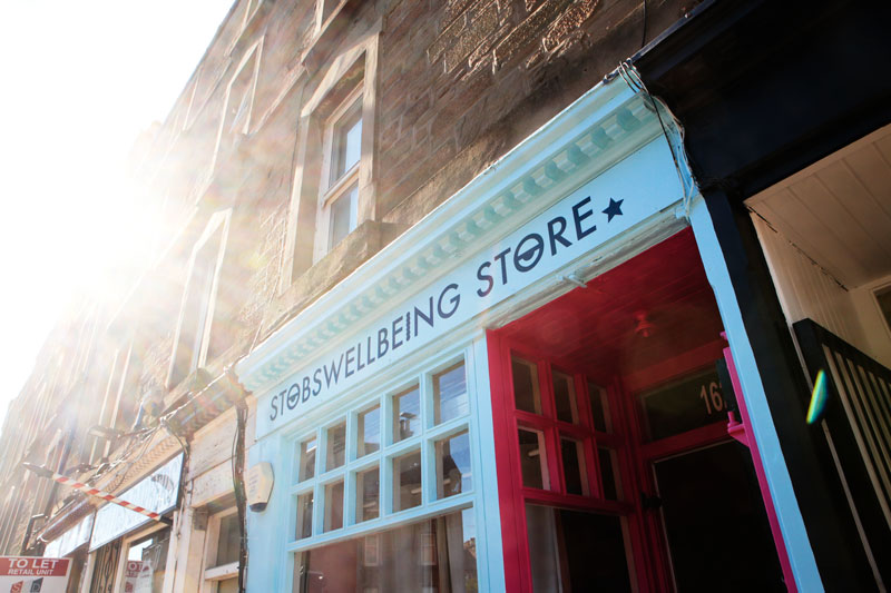 Shopfront in the sunshine called the Stobswellbeing Store.